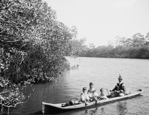 Seminole Indian and Family Dugout Canoe, Miami, Florida, c.1910-20 by Detroit Publishing Co.